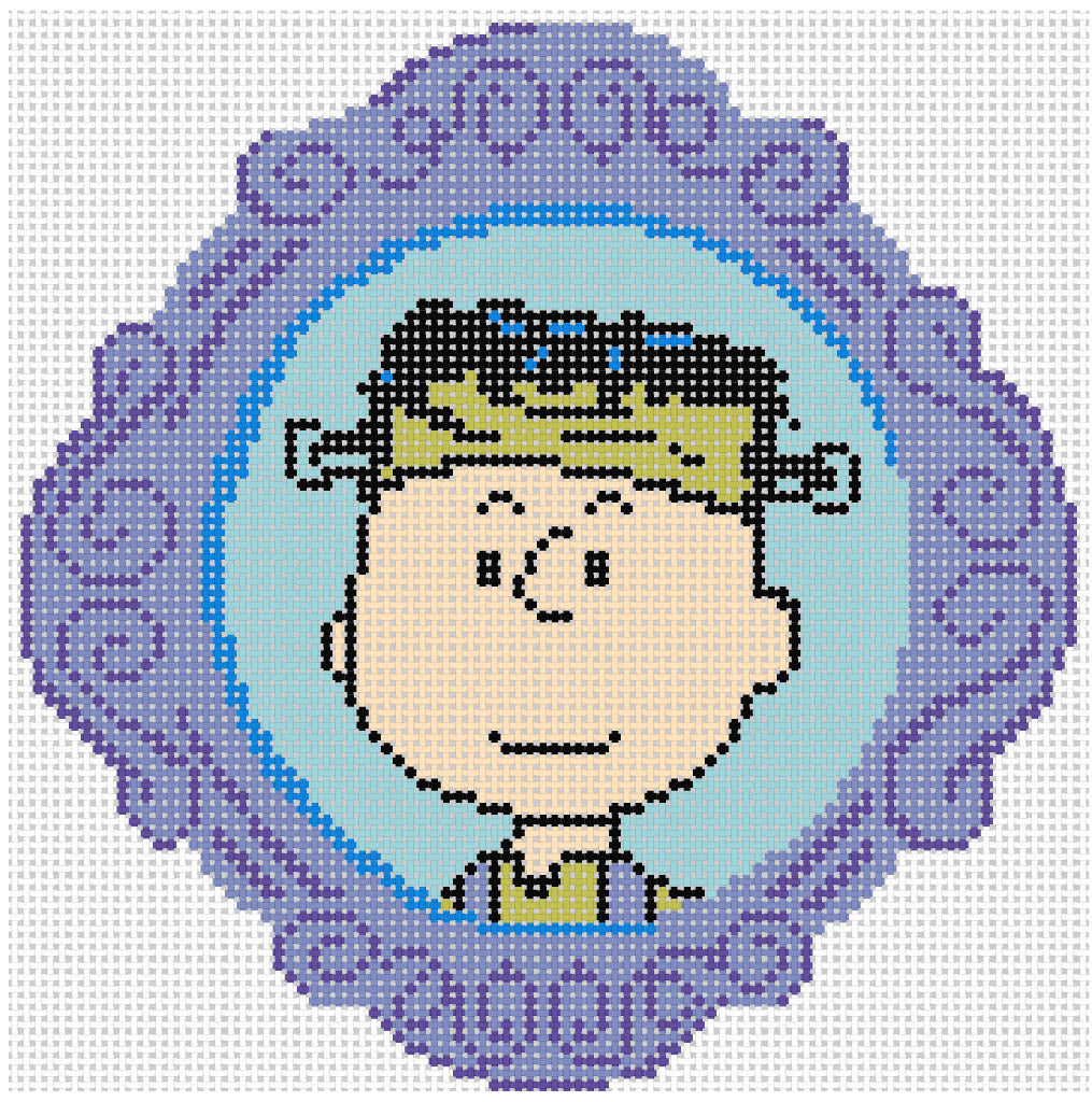 Needlepoint design of Peanuts Charlie Brown dressed as frankenstiein in a purple frame on a white background of 18 mesh