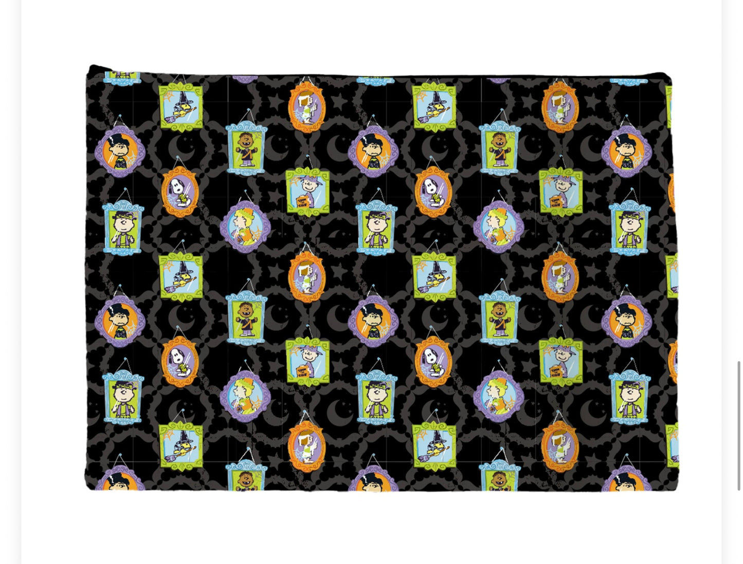 Woven zippered bag with Peanuts characters In Halloween costumes on a black background