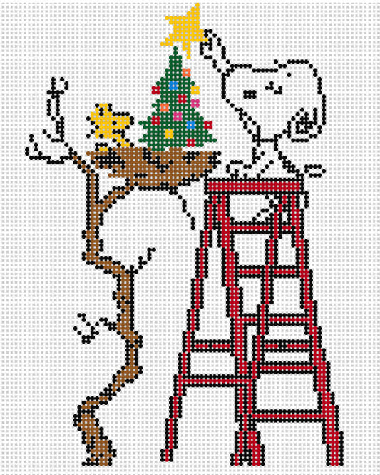 Needlepoint Canvas of Snoopy and Woodstock Decorating Tiny Christmas Tree