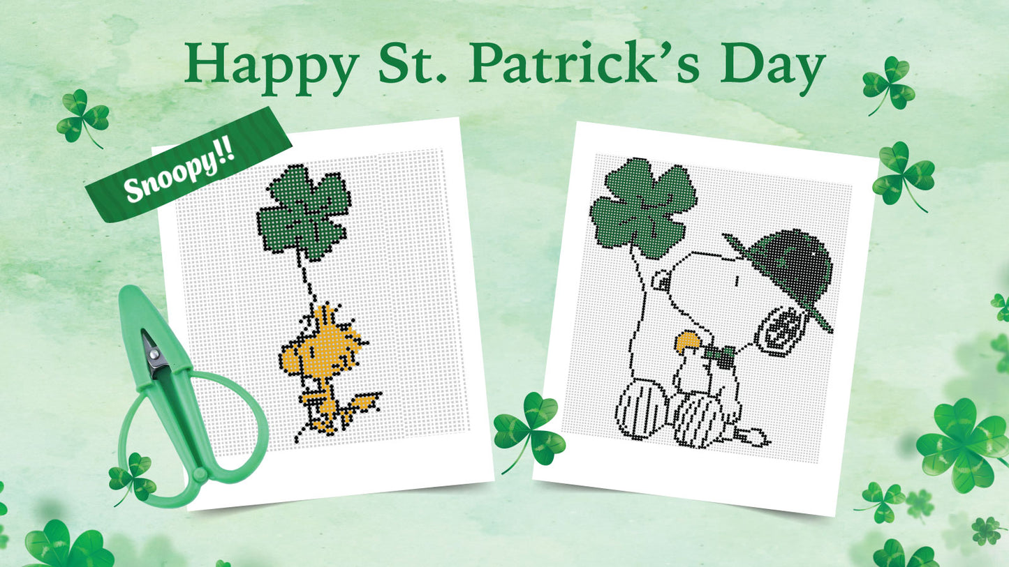 St. Patrick's Day-themed cross-stitch patterns with Snoopy and Woodstock on a green background with shamrocks.