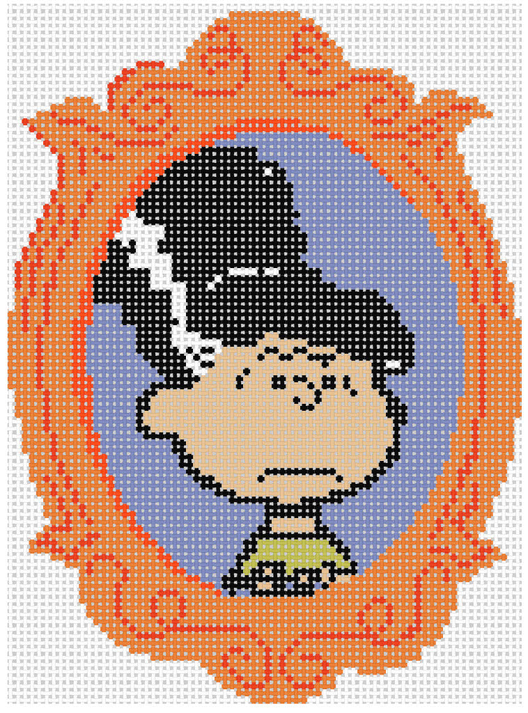 Needlepoint design of Peanuts Violet dressed as the bride of frankenstein in an orange frame on a white background of 18 mesh