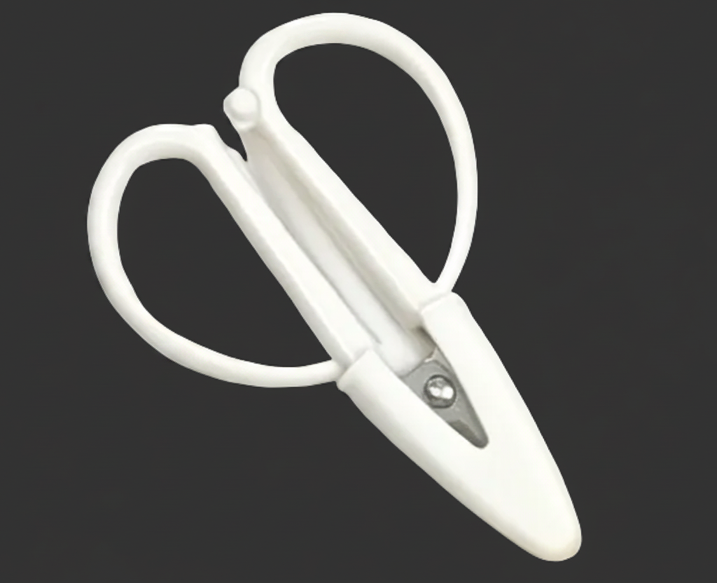 White mini snip with protective cover